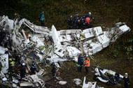 Rescuers search for survivors from the wreckage